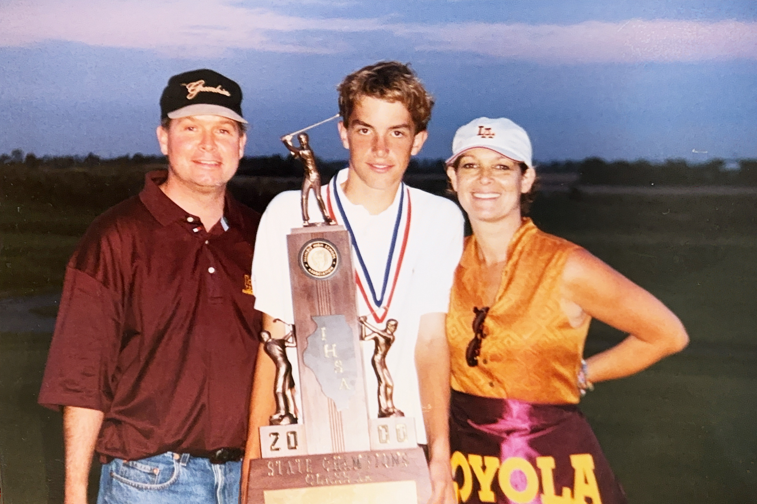 Loyola with parents.png