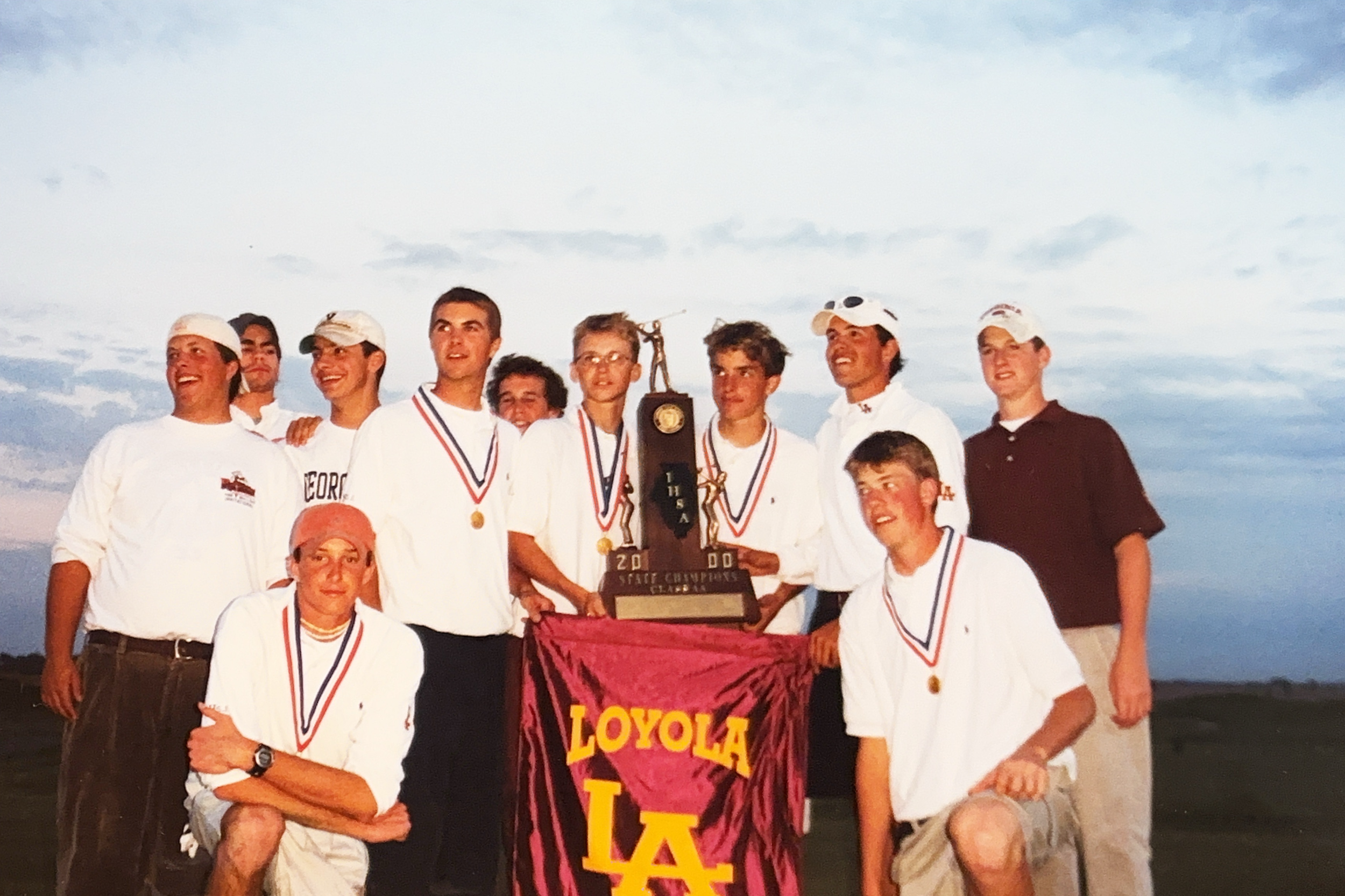 Loyola with team.png