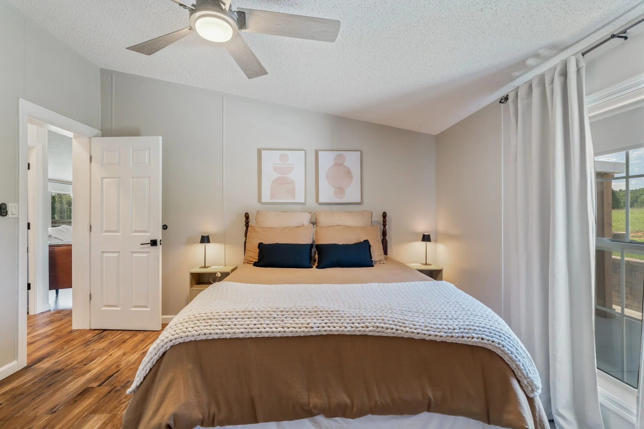 Comfortable guest bedroom with mountain views in a spacious Tennessee retreat