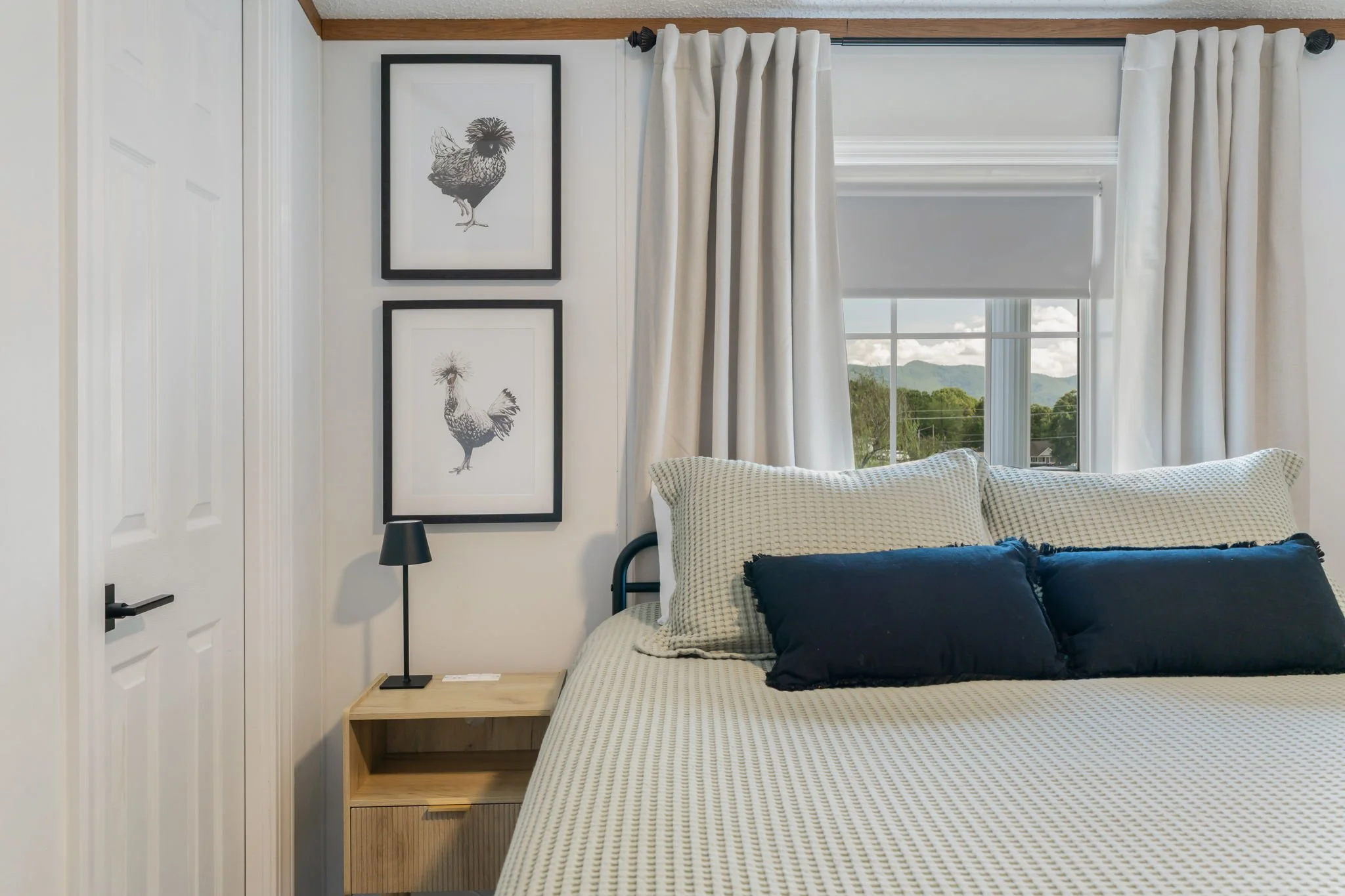 Spacious bedroom with mountain views at this Smoky Mountains vacation rental near Knoxville and Pigeon Forge