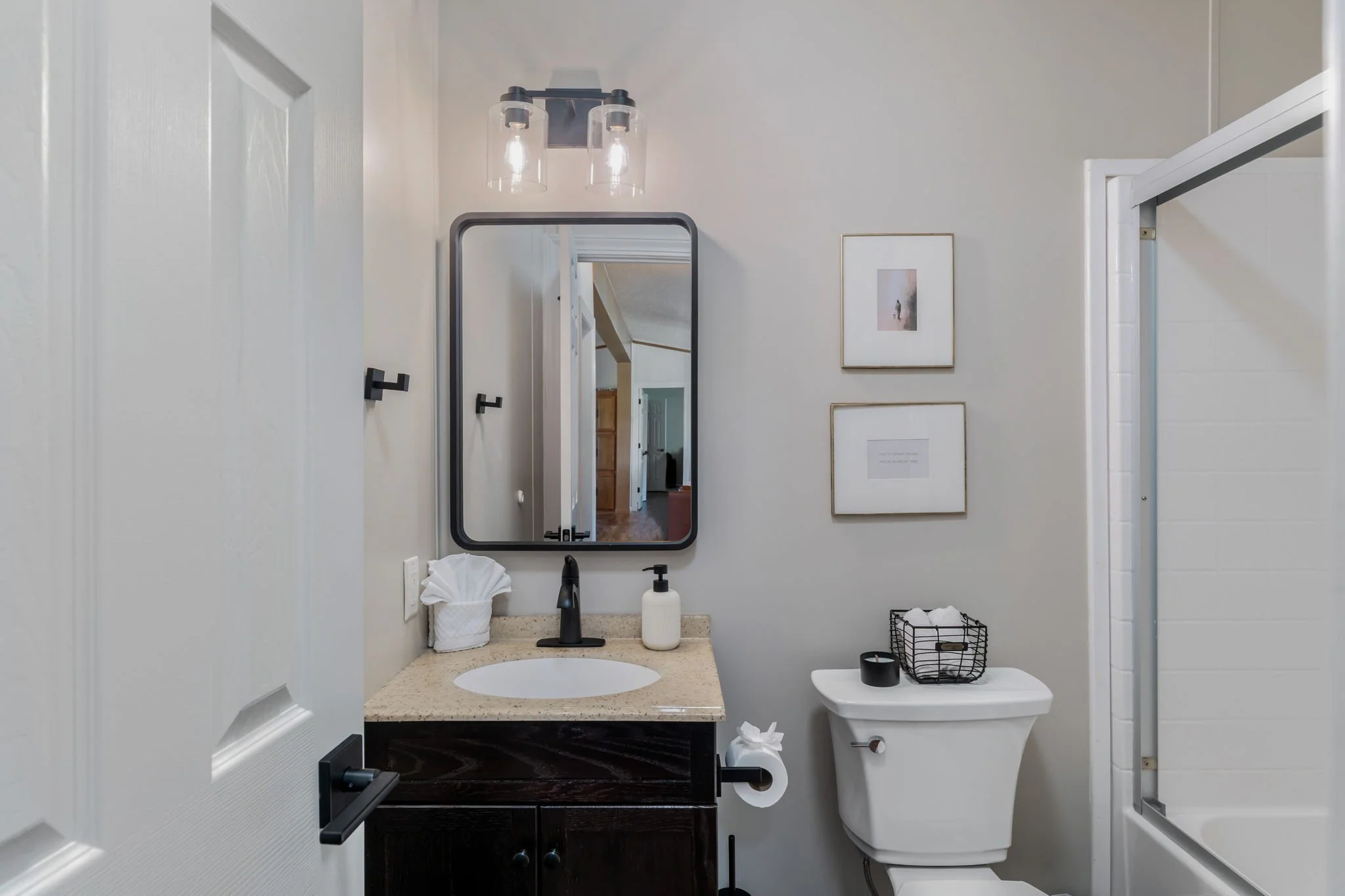 Clean and modern bathroom with updated fixtures in a private vacation rental