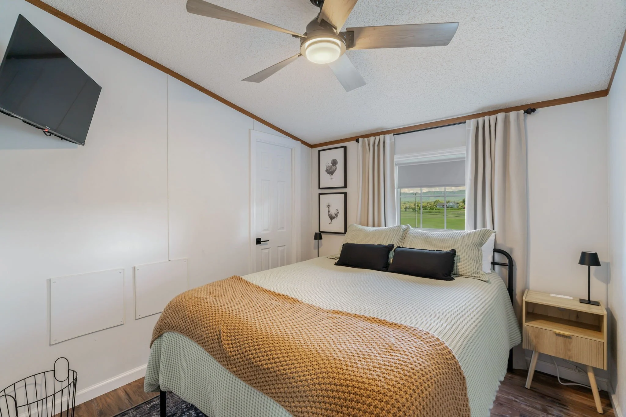 Cozy bedroom retreat with modern decor in a Smoky Mountain overnight rental