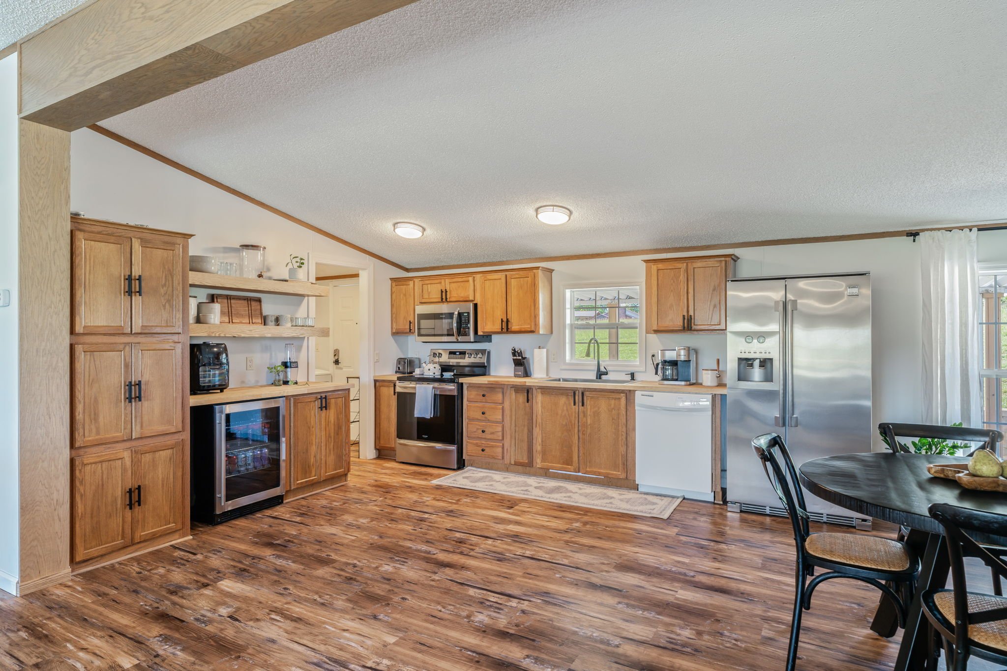 Fully equipped kitchen with modern appliances in a large group vacation home