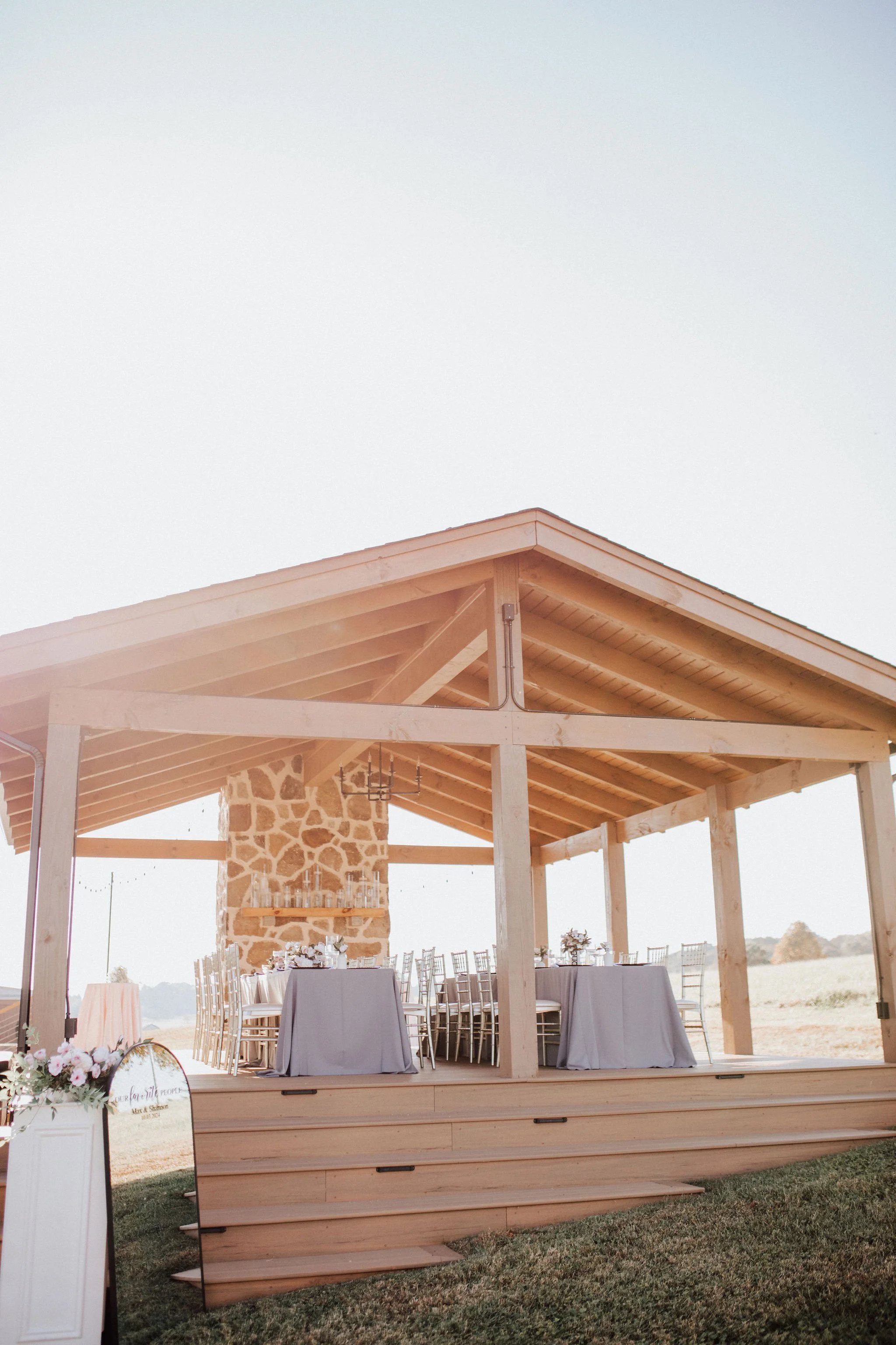 Open air pavillion wedding reception space.