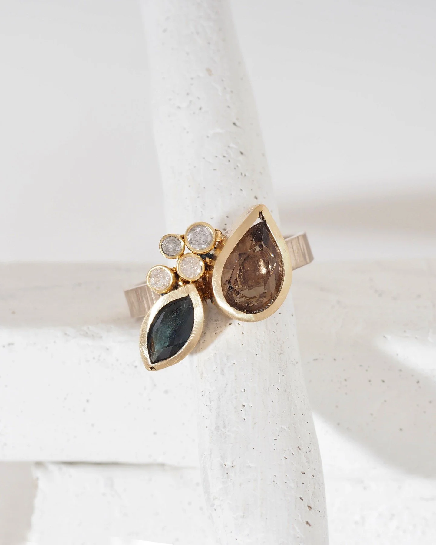 Perfectly imperfect bespoke diamond ring. Made with recycled gold and platinum. Lots of texture in the band and a softly organic bezel setting making this ring unmistakably handmade and special. These are ethical diamonds by @misfitdiamonds in variou