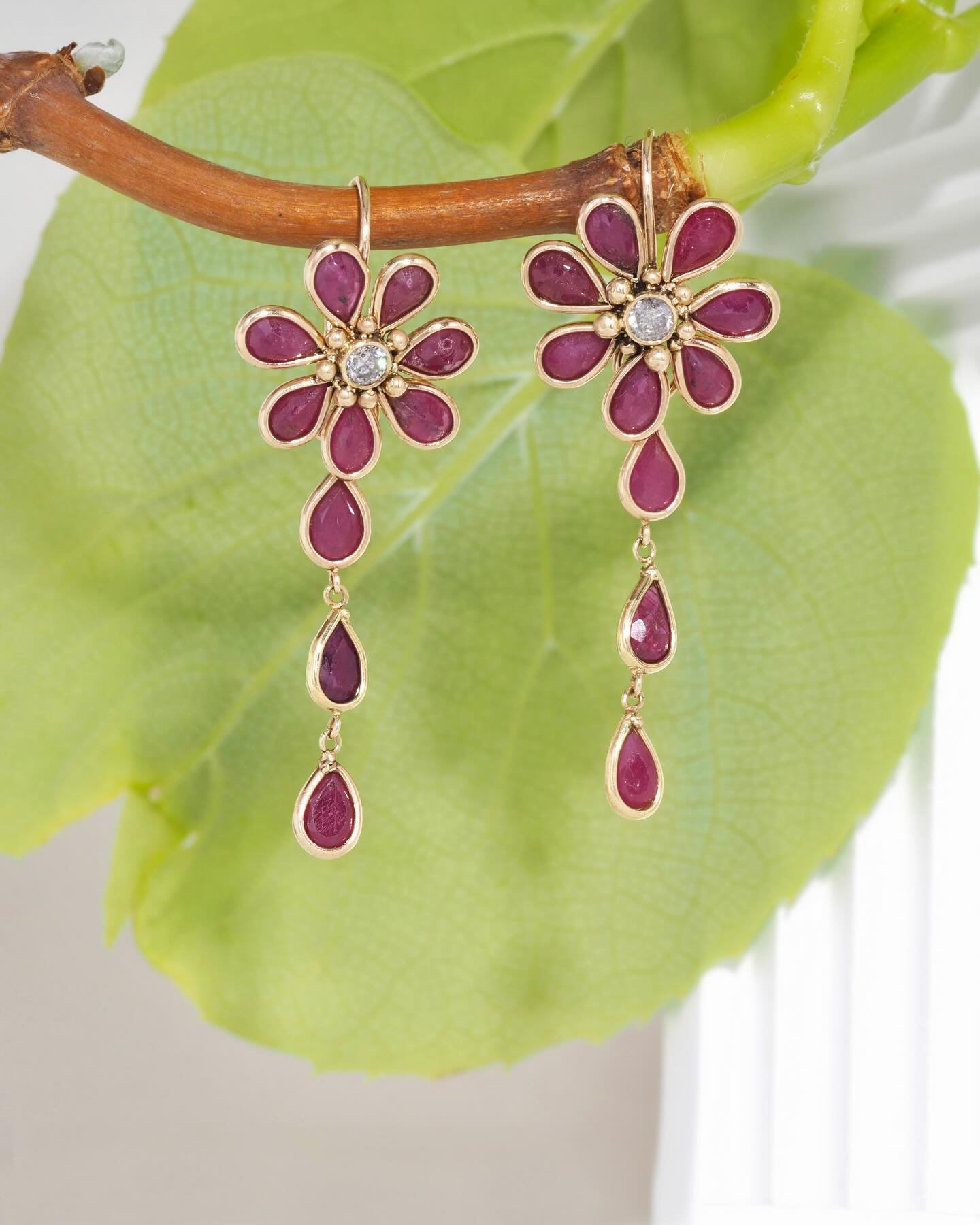 Convertible earrings! Bezel set petal-shaped stones with a diamond in the middle. They can be worn a couple of ways depending on one&rsquo;s mood or the occasion. This was an incredible project, thanks to the creativity of the client! 14k recycled go