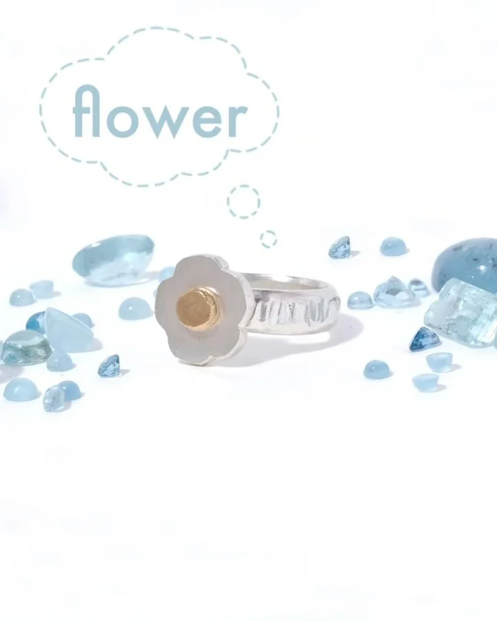 Flower ring in sterling silver with a 14k solid gold center (repurposed metals). Hand formed textural band, lots of sweetness, but a sturdy ring that lets you bring a bit of garden wherever you roam. Available in any size you wish; made to order, so 