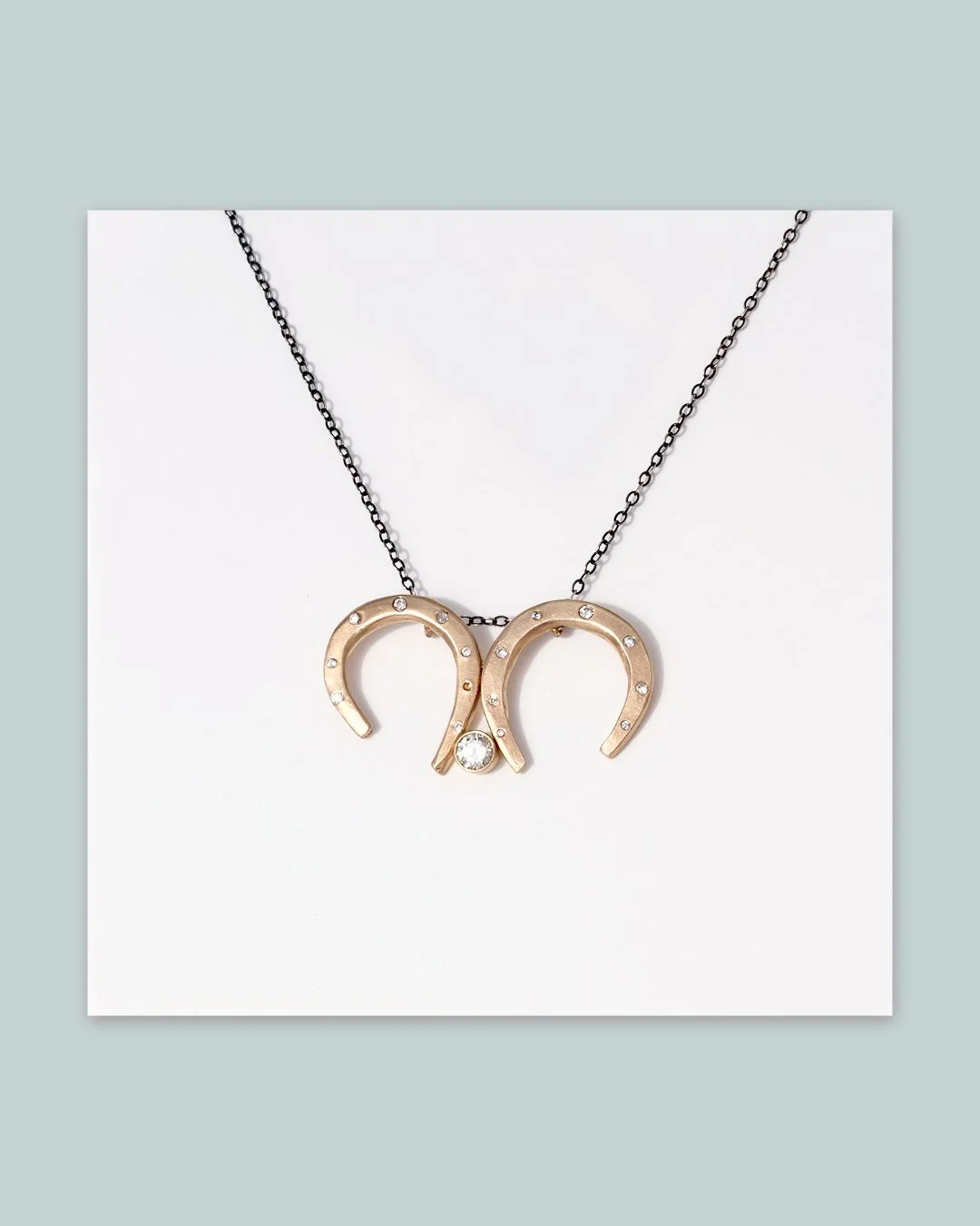 Ethical real diamonds and repurposed 14K gold celebrate Aries with a constellation of 17 diamonds, April birthstones, circling the ram&rsquo;s horns. Lots of sparkle in this modern charm representing Aries birthdays.

We&rsquo;ve paired the charm wit