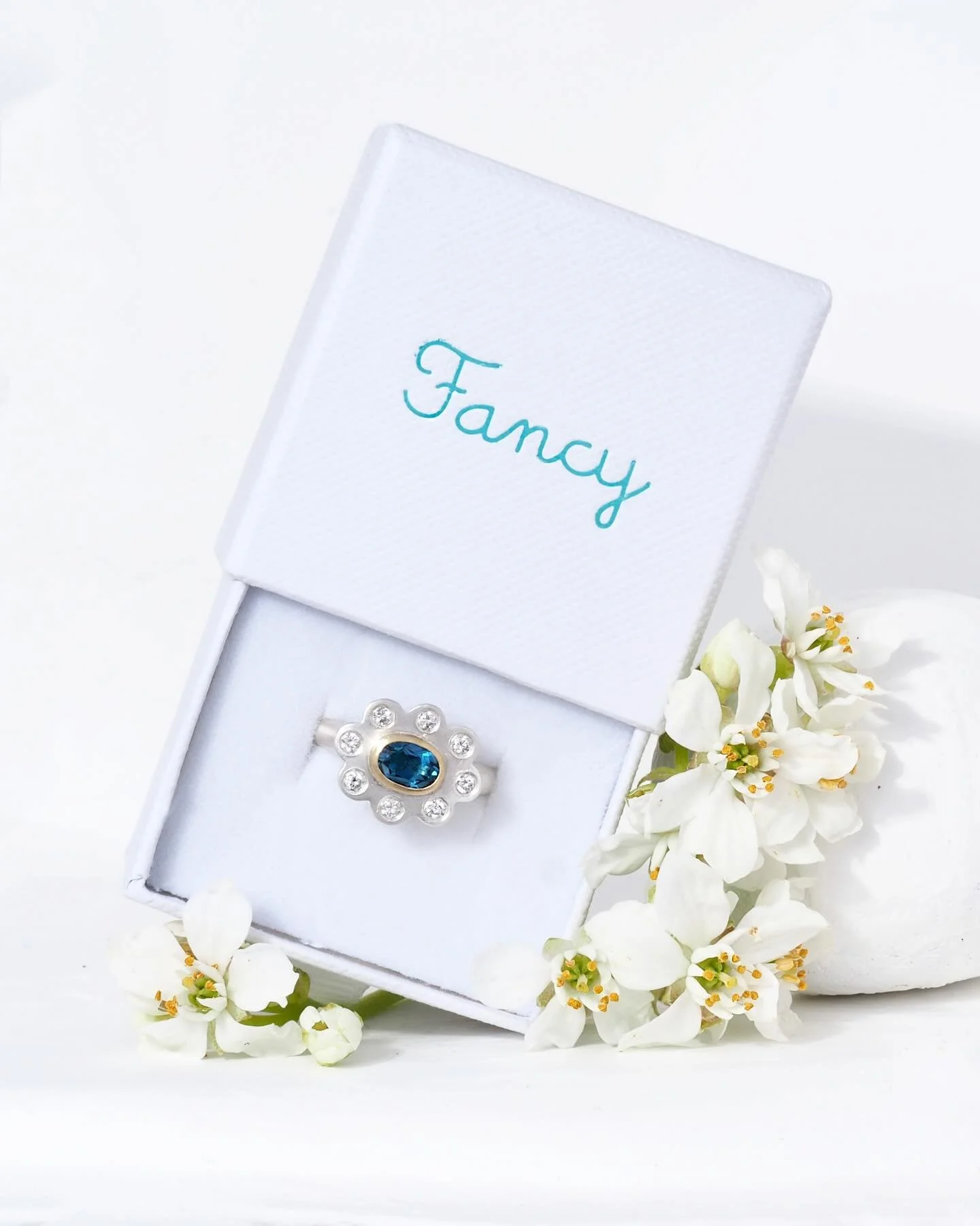 Springtime ring set in sterling and 18k gold, featuring stones recycled from a customer&rsquo;s pendant-

Available to order with your choice of center stone! It&rsquo;s not up on our website yet, but message us and we can get started making one exac