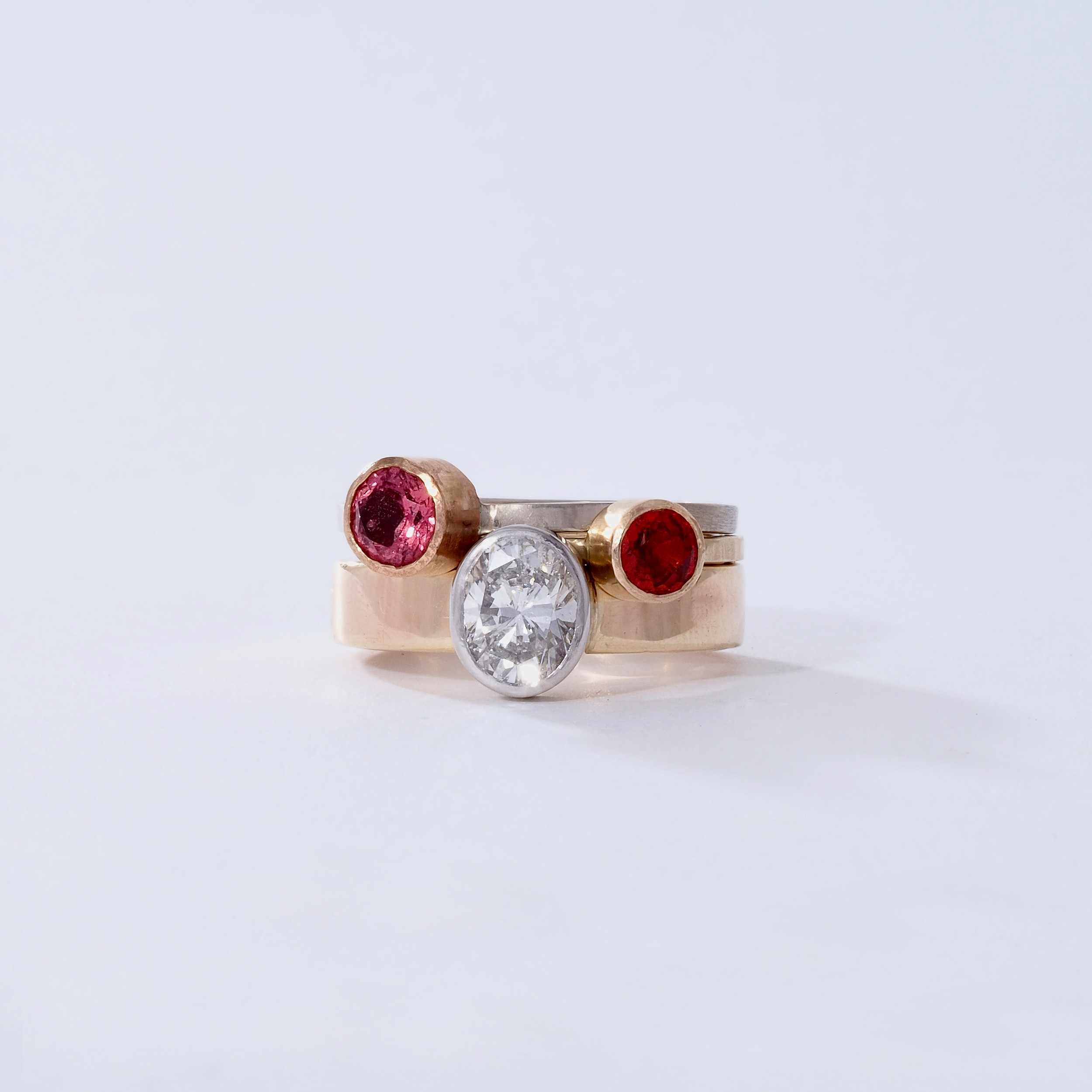Oval diamond with two other rings 11.png