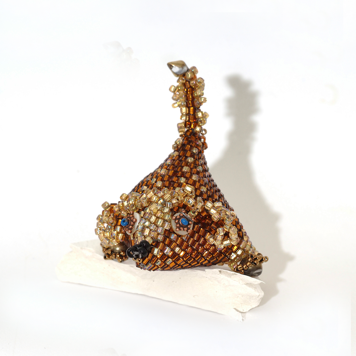 P1017438 11 j3 beaded creature.png