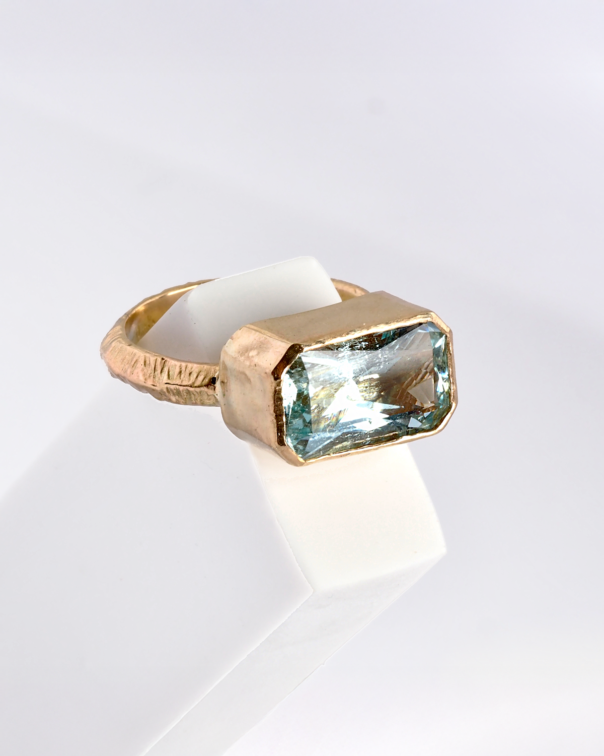 P1010469 Aquamarine side view on eraser 4x5.png