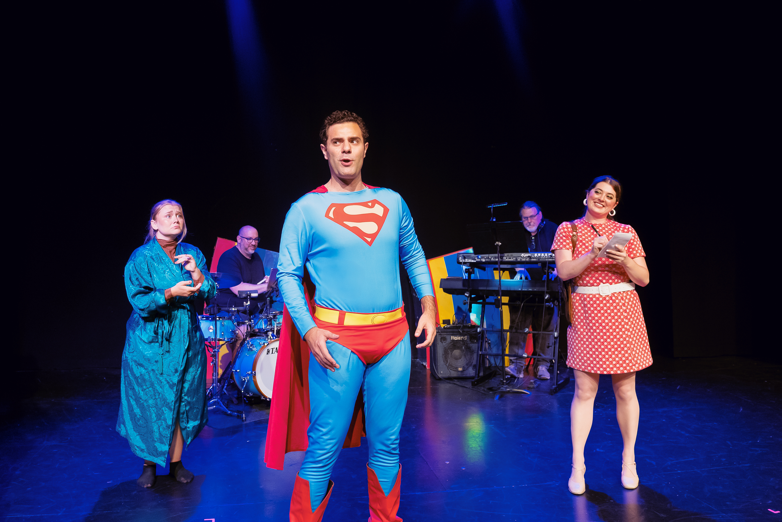 Elliot White as Superman, Emily Jones as Lois Lane, and Julia McCammon