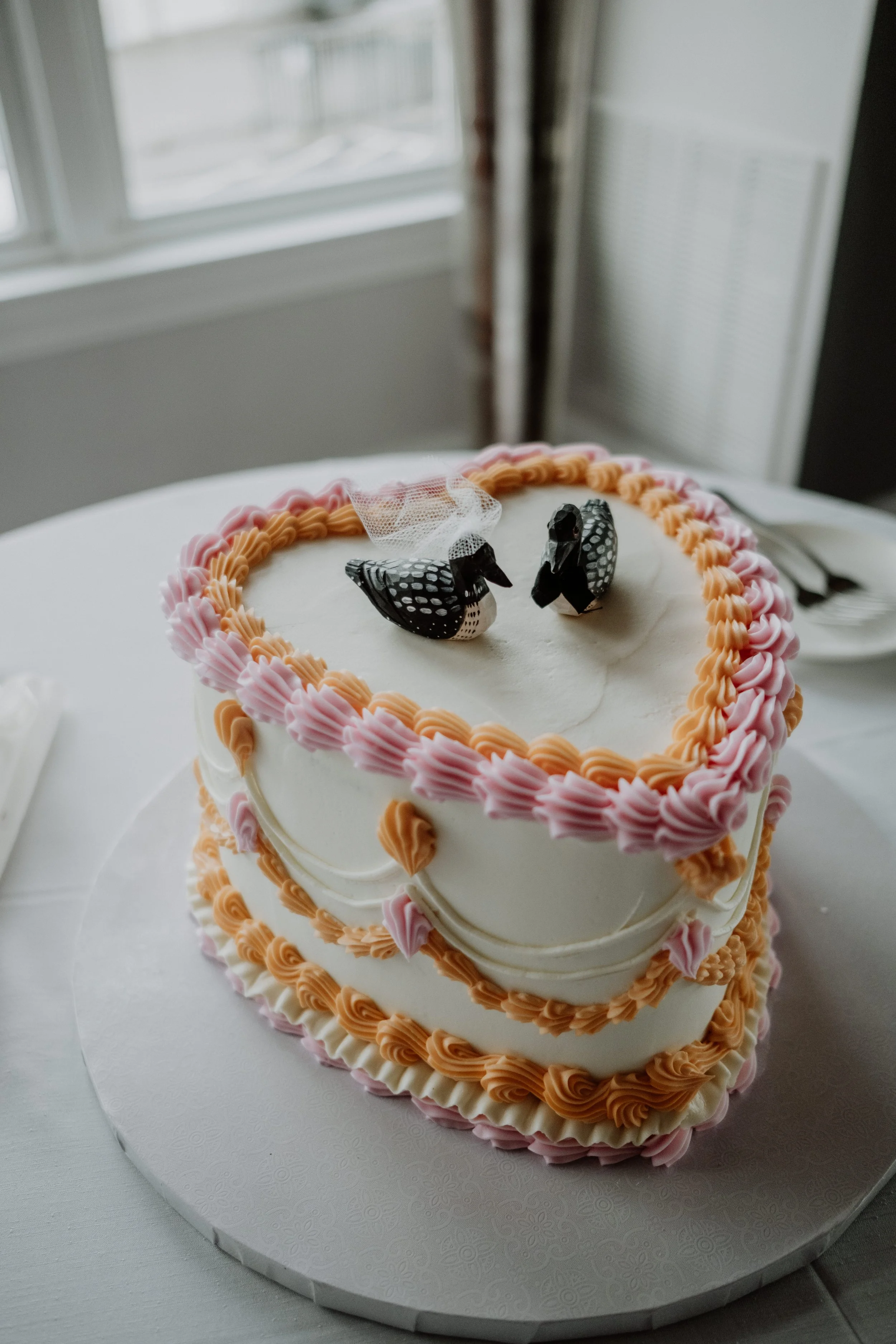 Our wedding cake was a lemon- raspberry cake from our favorite bakery- Tripoli's in Lawrence, MA. Despite growing up 500 miles away from each other, thanks to Ethan's dad, Ethan still grew up enjoying the perfection that is Tripoli's. Our cake topper