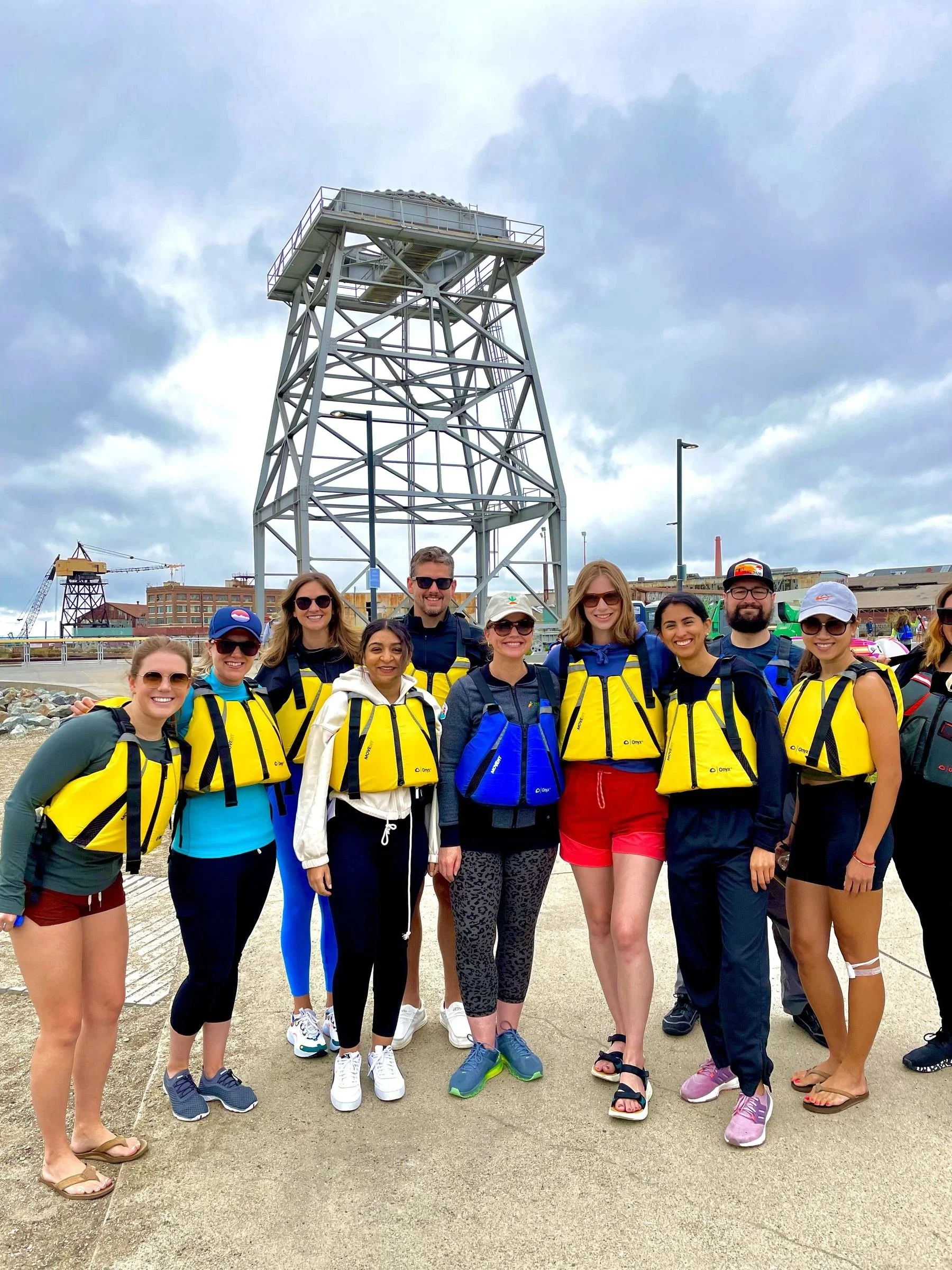 A private group in life jackets before a team paddle at Crane Cove Park