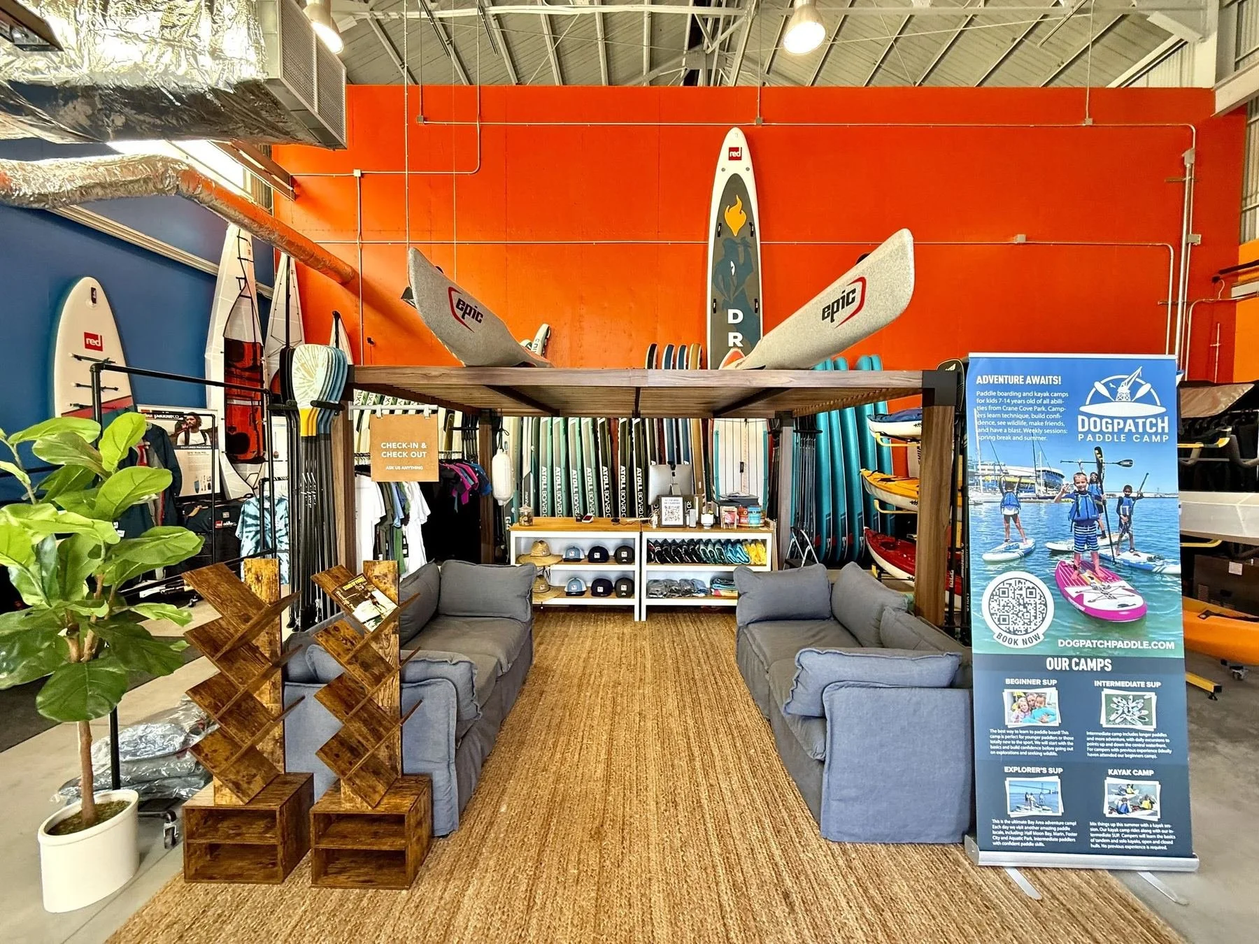 Kayak and paddleboard storage racks inside the Dogpatch Paddle shop