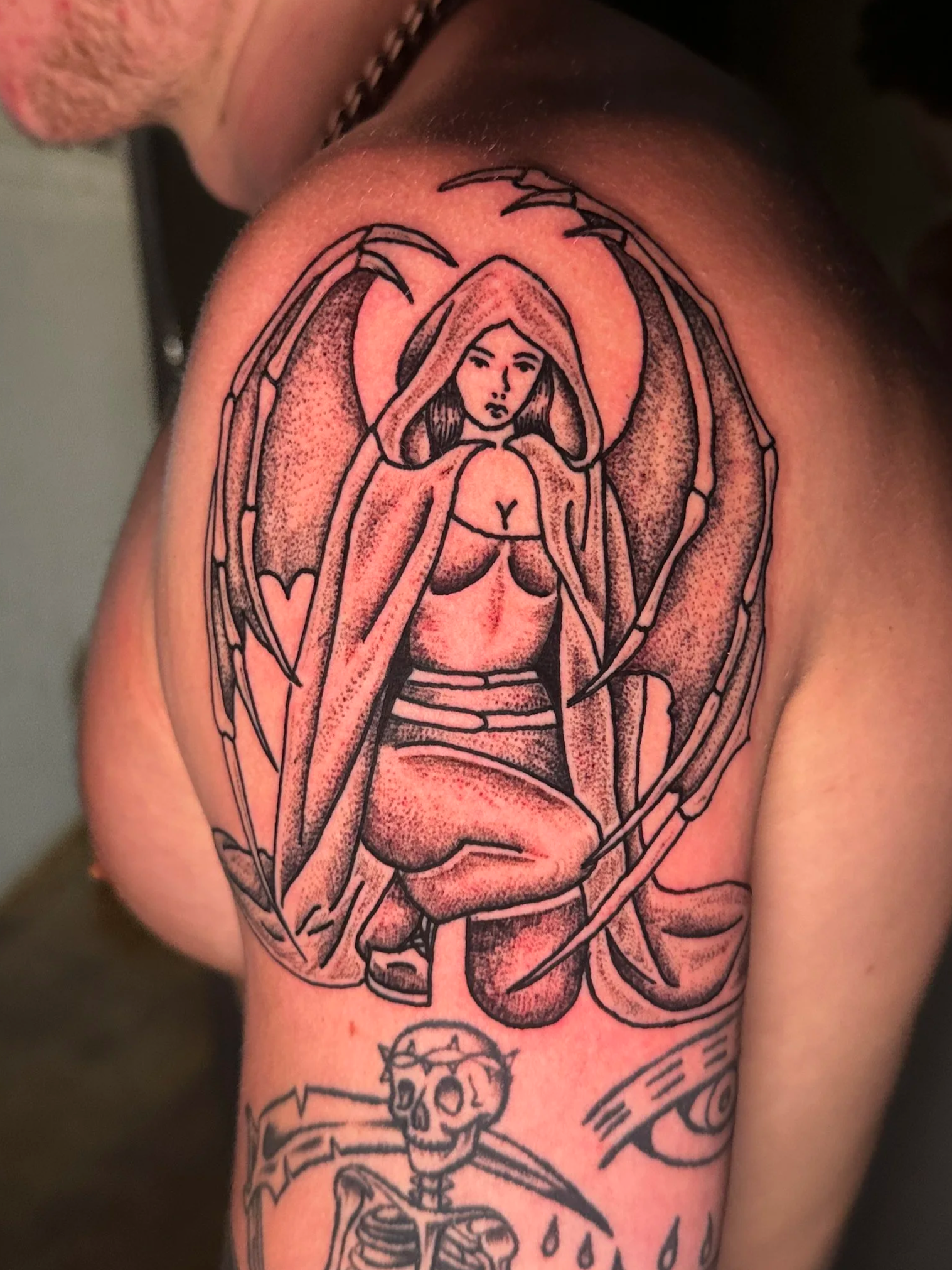 Tattoo of a demon woman