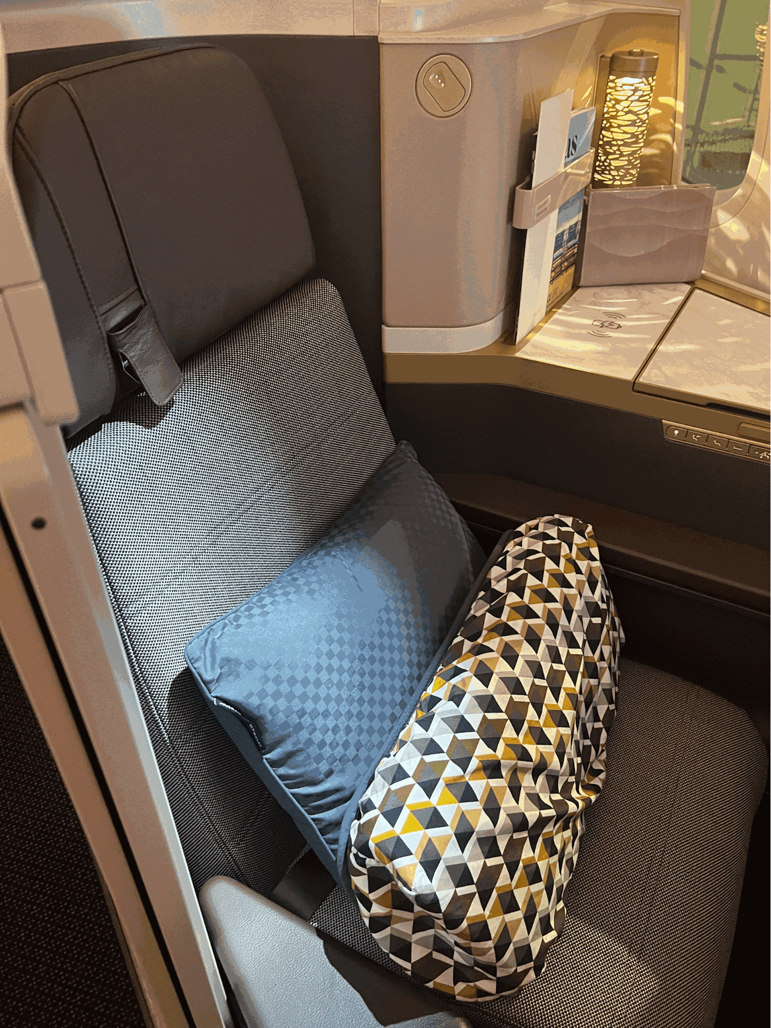 Etihad Business Class Seat with Armani Pillow and Mattress Pad - © AviationWithKrish.com 2024