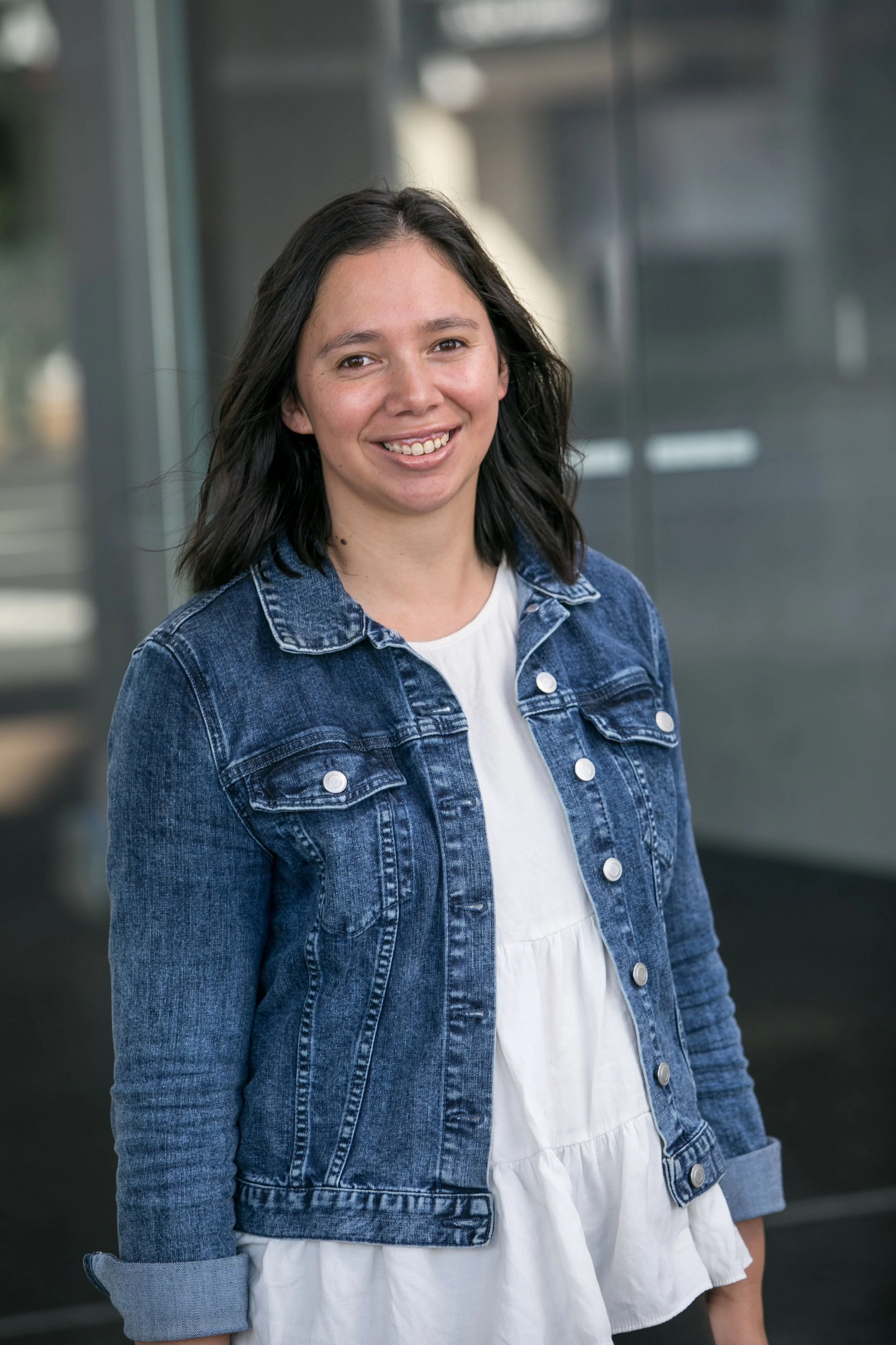 A picture of Amy McLean (Coach) in a denim jacket