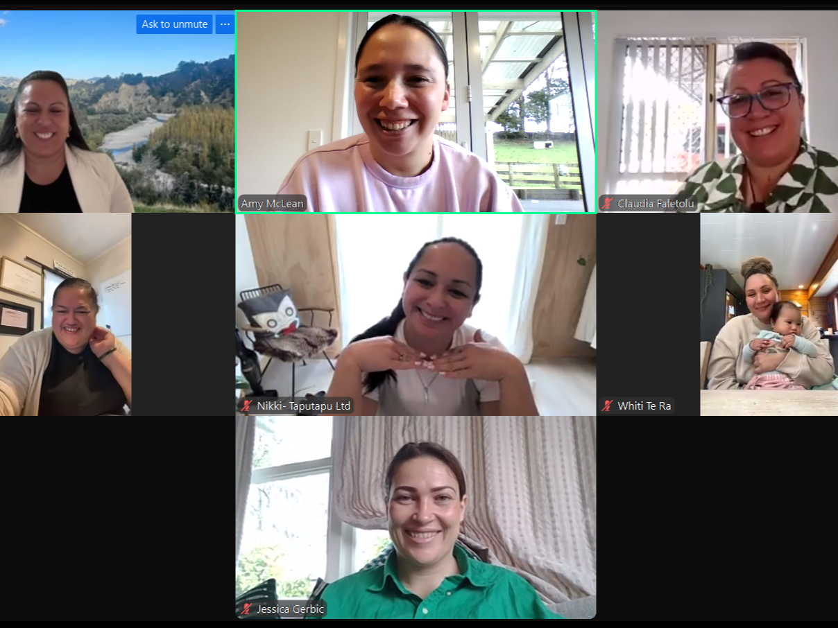 A picture of an online kōrero group with seven wāhine, some smiling and some holding children. The women are in various indoor settings, with different backgrounds including a mountain landscape, a porch, and decorated rooms.