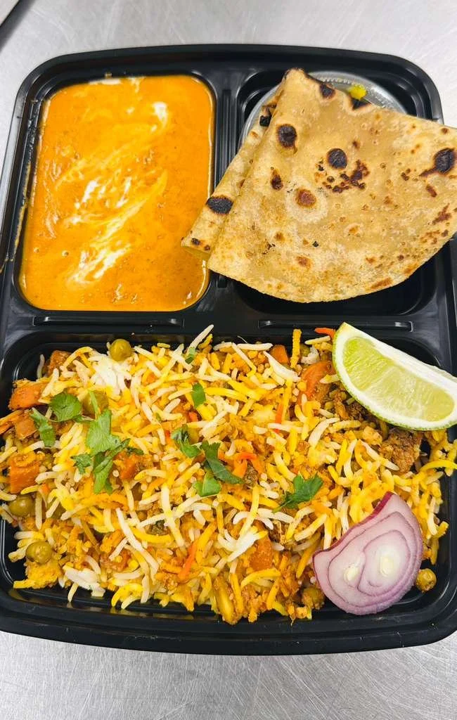 Roti+Paneer Curry+Veg Biriyani+Sweet