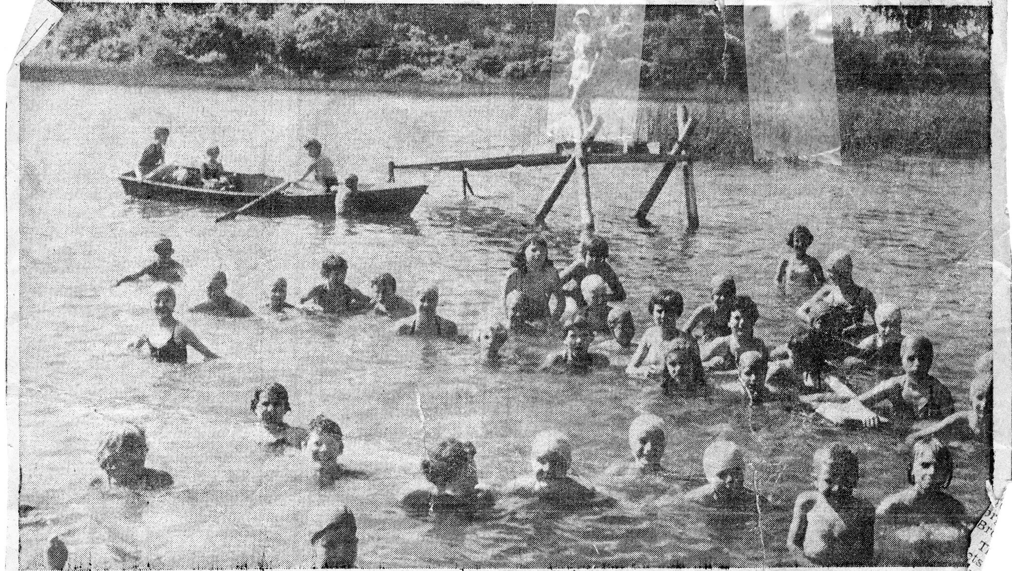 1950 shows a girls' camp. They had a row boat for emergencies and a dock.