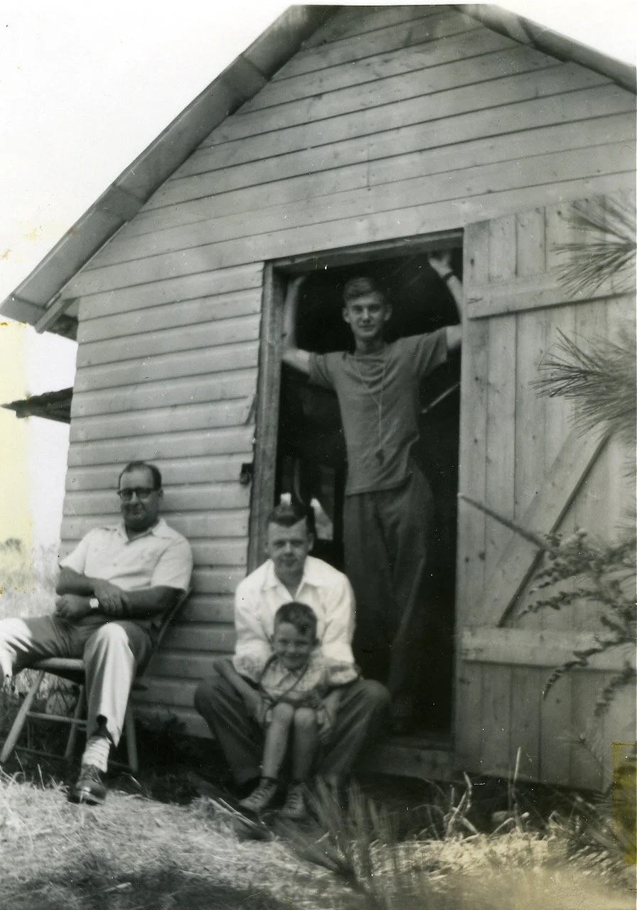 Leaders at the same camp shown in photo 22. Sammy at left; George Hickey with my older brother Neil in front. The other lad is unknown.
