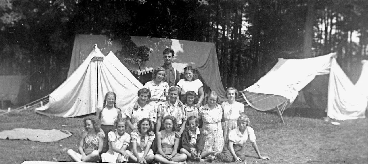 1940 girls' camp. Uncle Charlie is in the back row; Aunt Kath is kneeling in the second row; second from right.