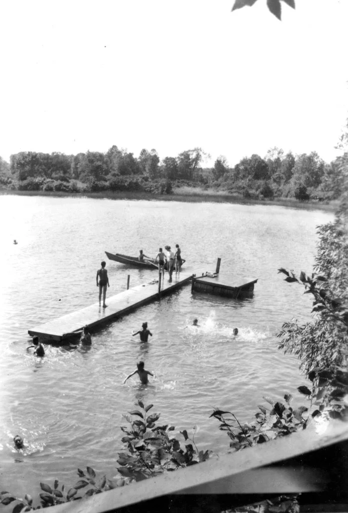 Taken from the top of the hill overlooking the swimming hole on Sheik's. The peg board for names of who was in the water was at the top of the hill ... then you went down the staircase to the water and the 'buddy system' was strictly enforced. 
The s