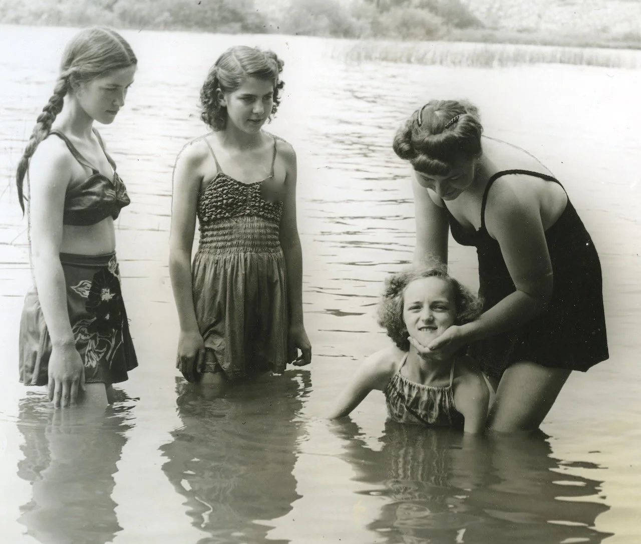 1940s Swim class at a girls' camp. Each camp had swim lessons from a qualified instructor as well as AR instruction.