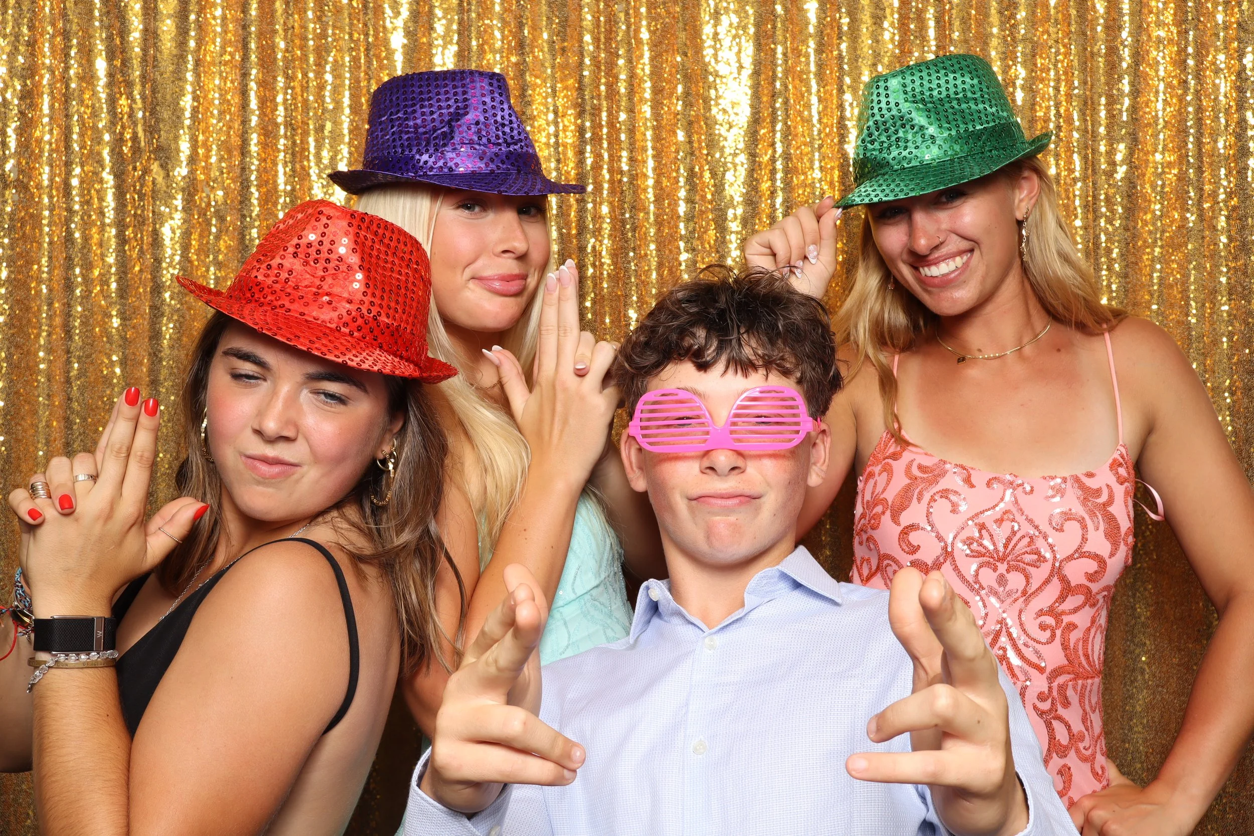 Girls with glitter hats at prom at photo booth rental party in Port St. Lucie, FL — D&amp;L Photobooths
