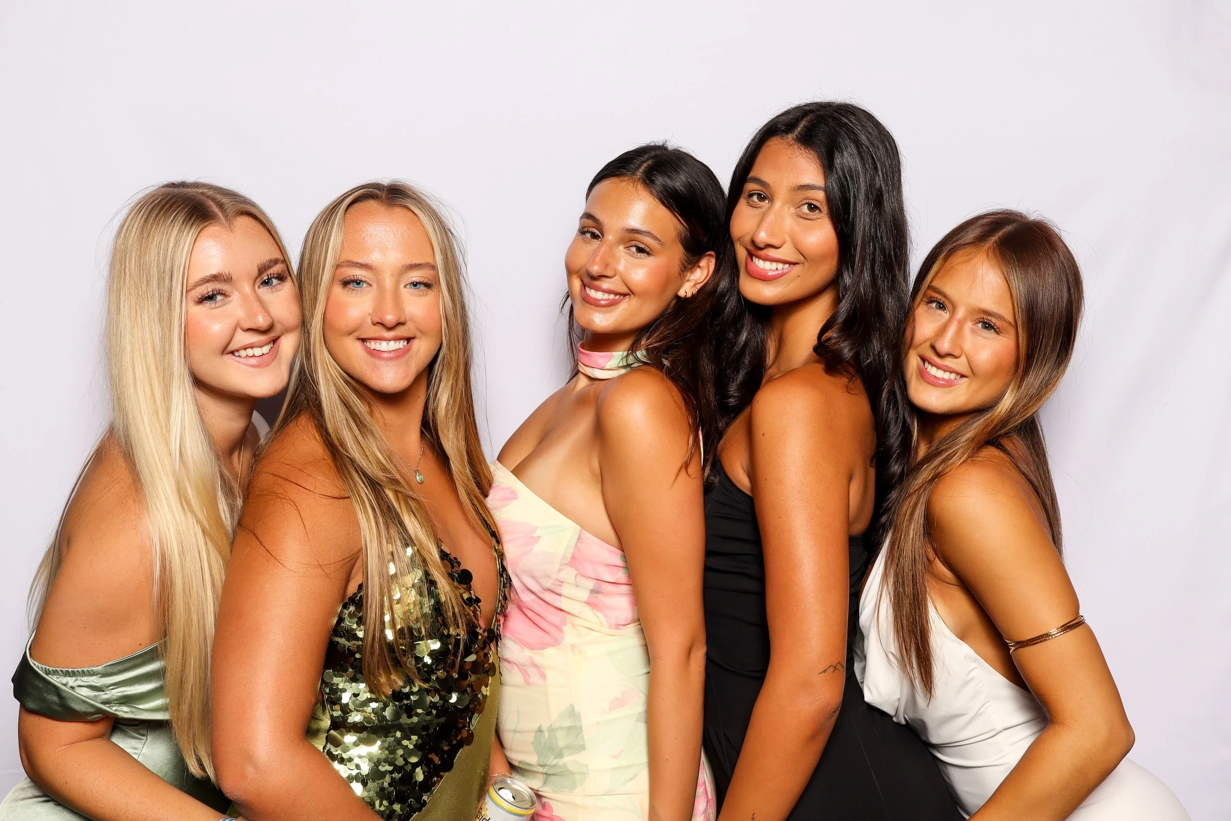Friends posing at photo booth rental at party event in Orlando — D&amp;L Photobooths