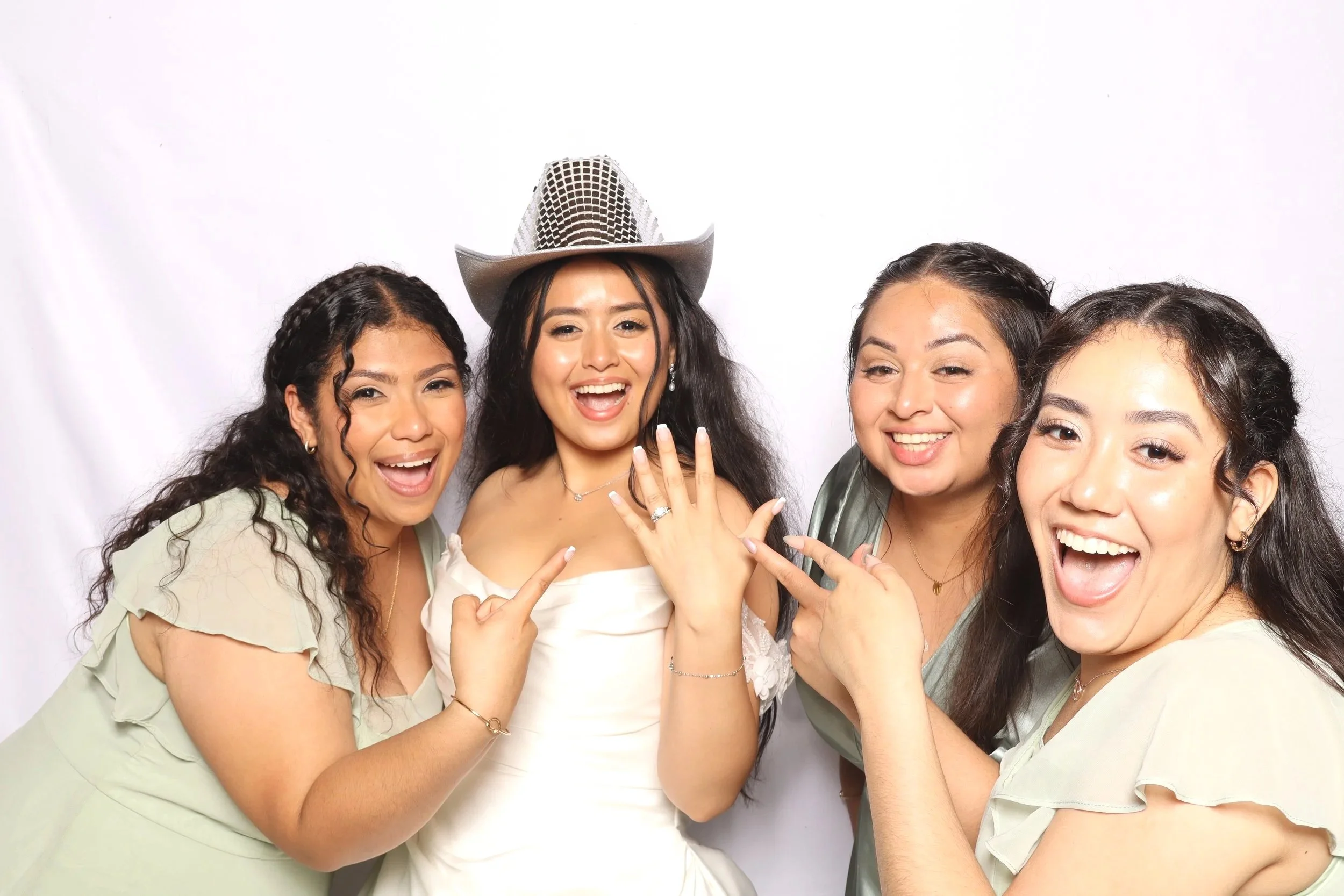 Bride and bridesmaids at wedding at photo booth rental in Vero Beach, FL — D&amp;L Photobooths