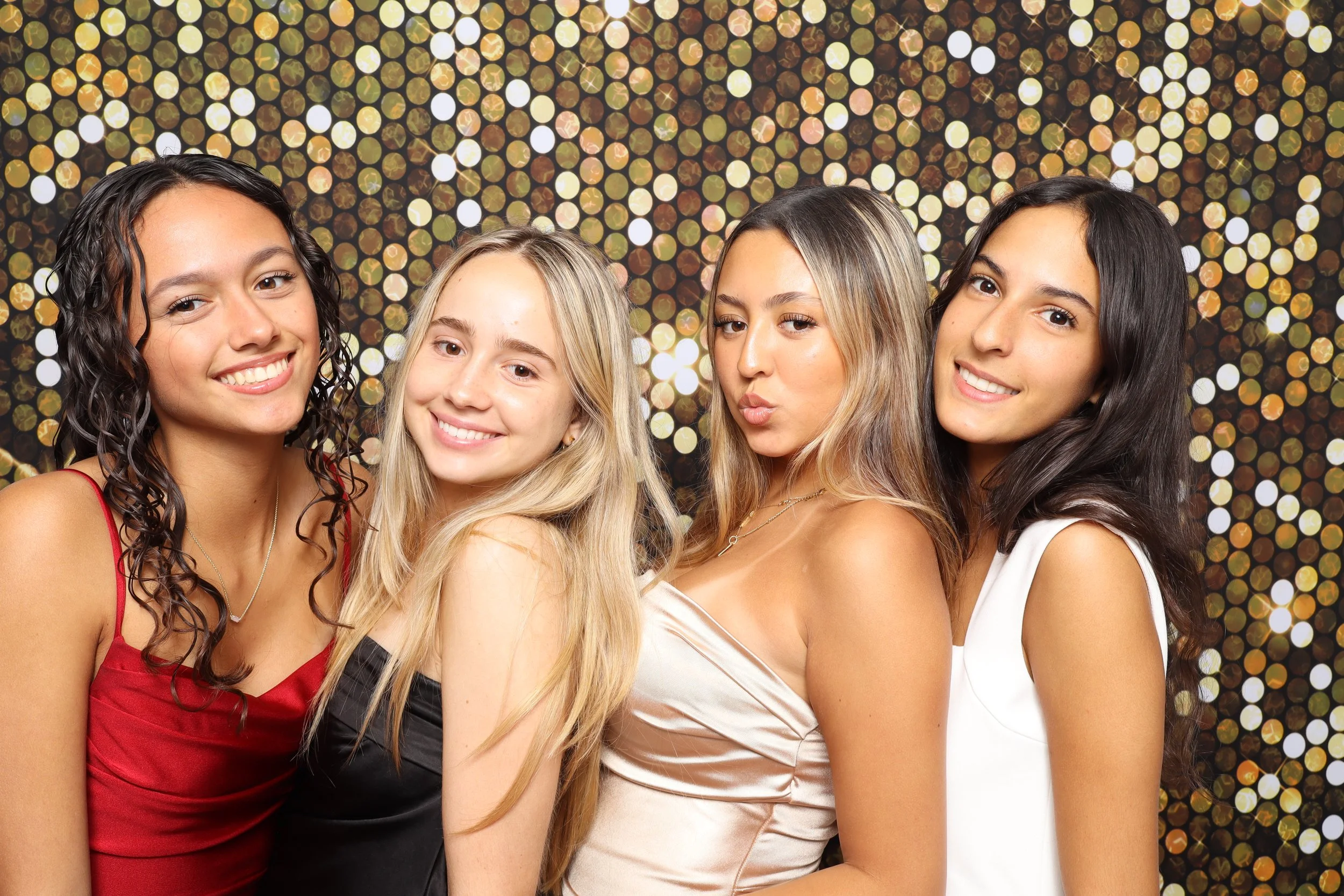 Friends posing at photo booth graduation rental at party event in Pembroke Pines — D&amp;L Photobooths