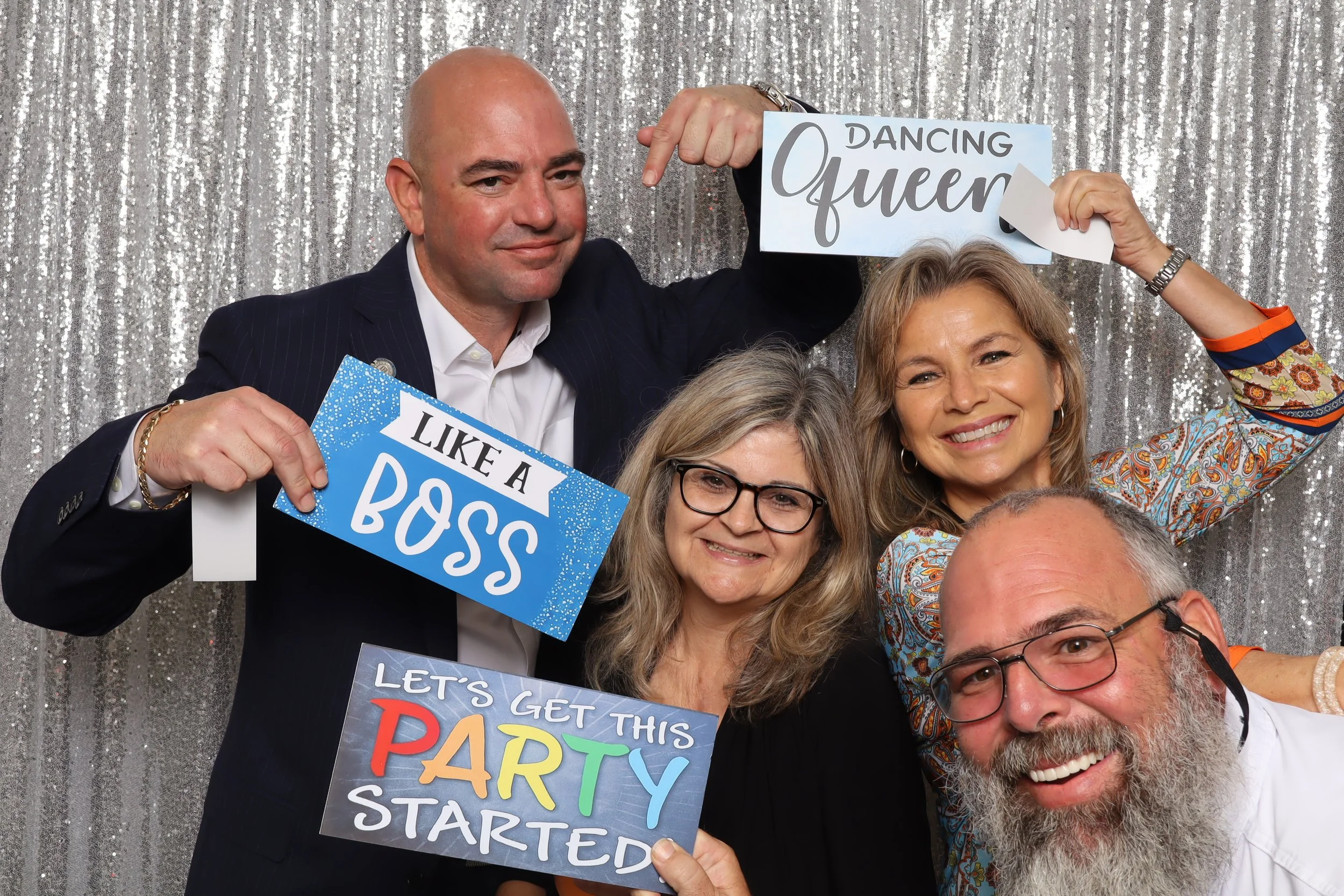 Guests having fun at photo booth for corporate party in Vero Beach, FL — D&amp;L Photobooths
