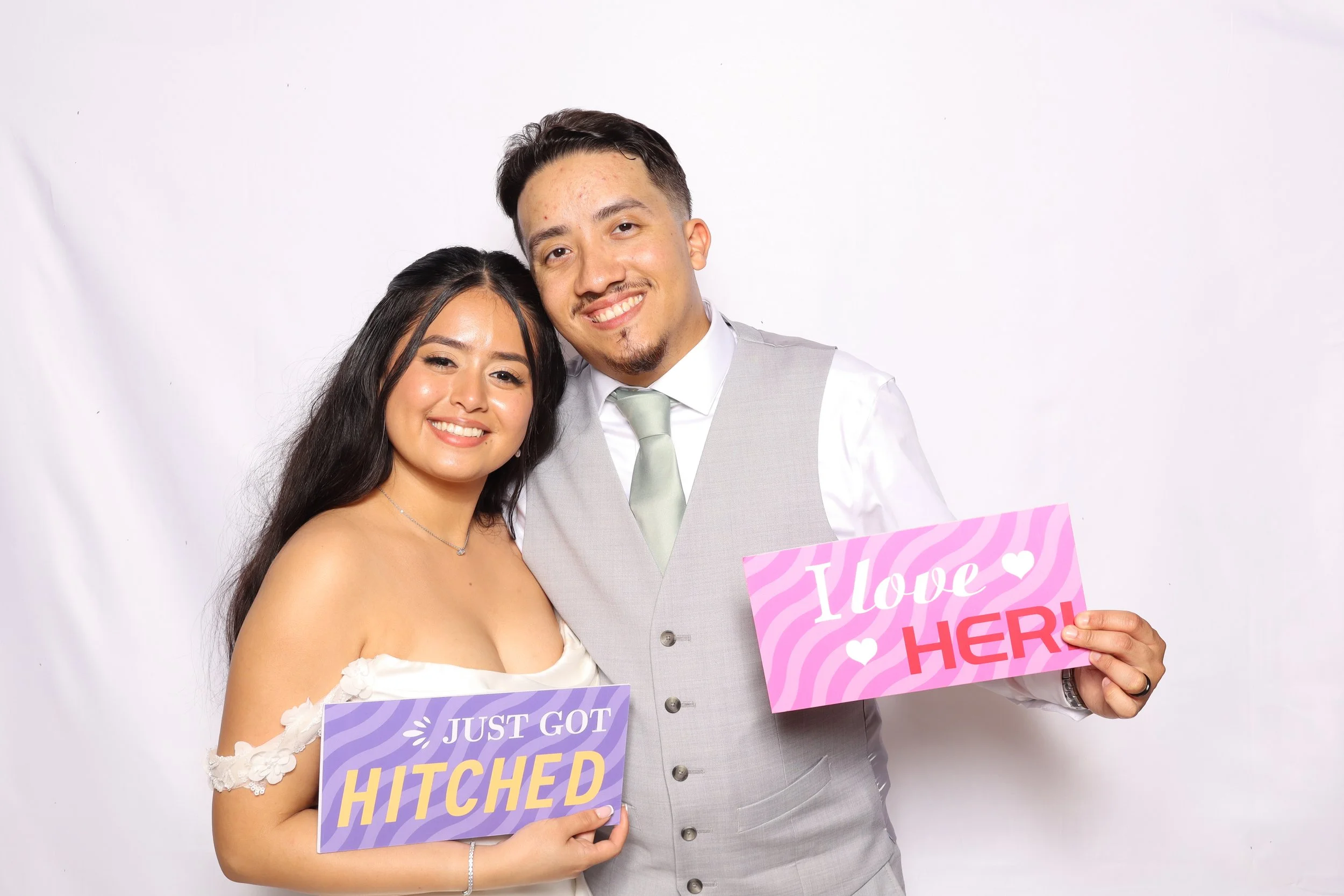 Wedding couple at photo booth rental in Vero Beach, FL — D&amp;L Photobooths