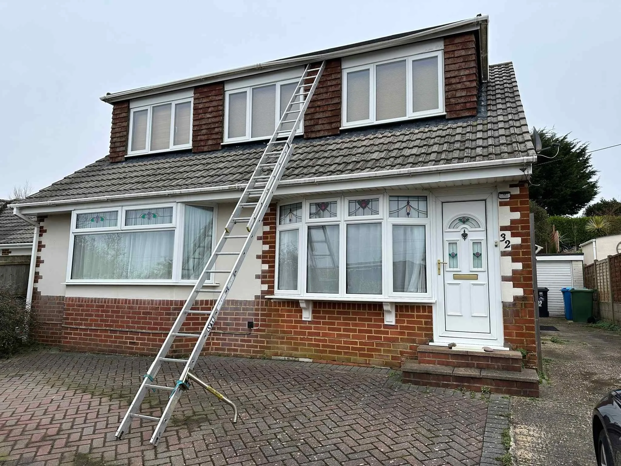 access the work to assess guttering.jpg