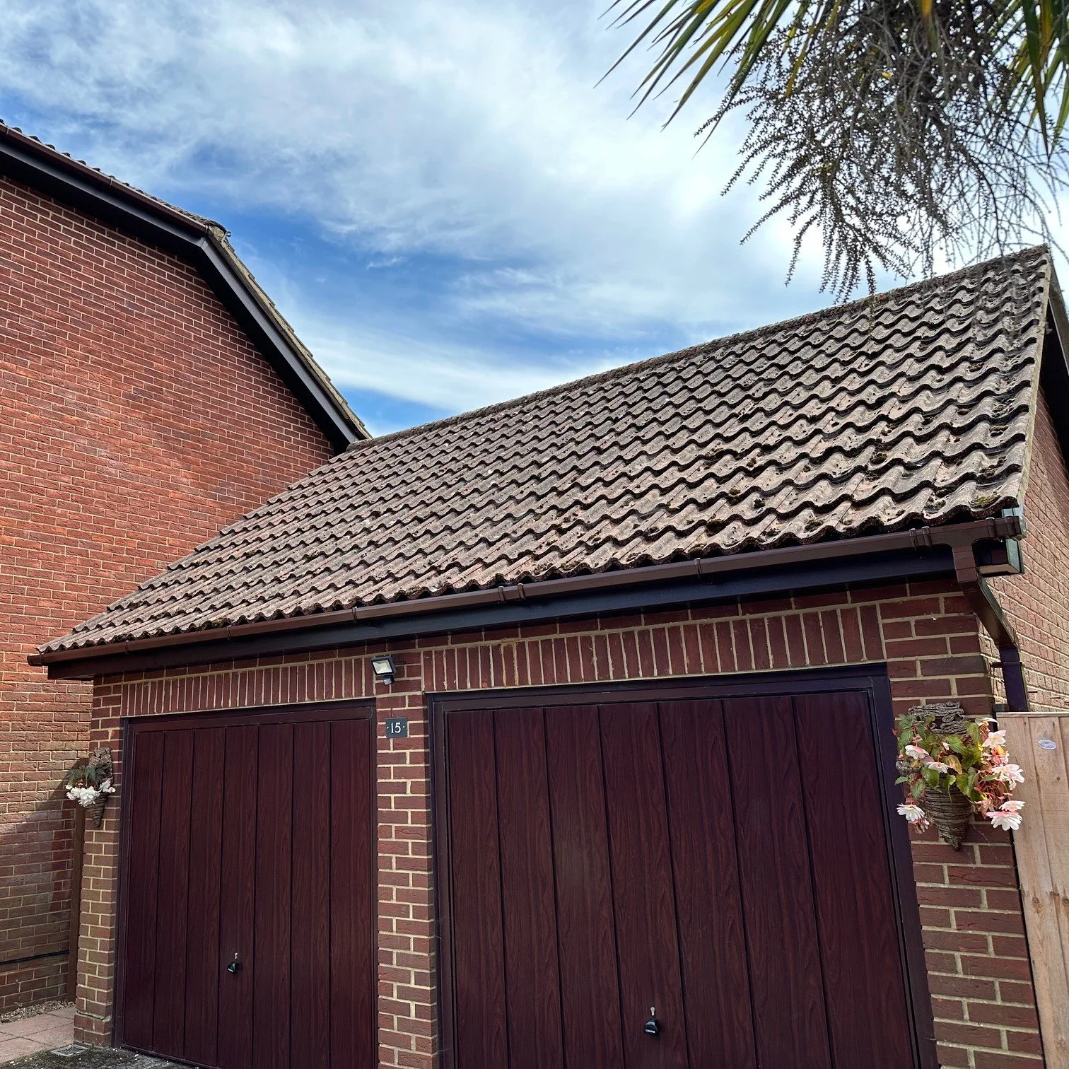garage rosewood fascia and soffit brown square gutters.jpg
