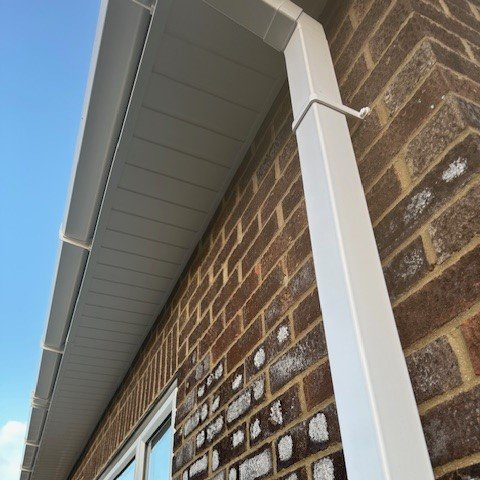 view from underneath showing new white tongue and groove soffits