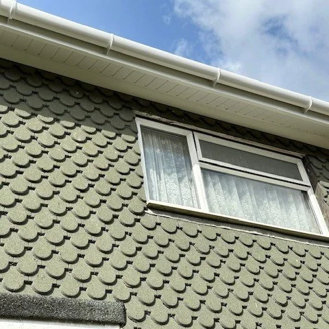front of the property showing new white fascias and soffits with white deep flow guttering