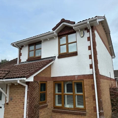 Property in Broadstone Poole with new UPVC Fascias and Soffits and white square guttering and white UPVC bargeboards