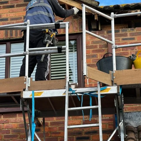 Access equipement to the rear of detached Poole property removing old bargeboards