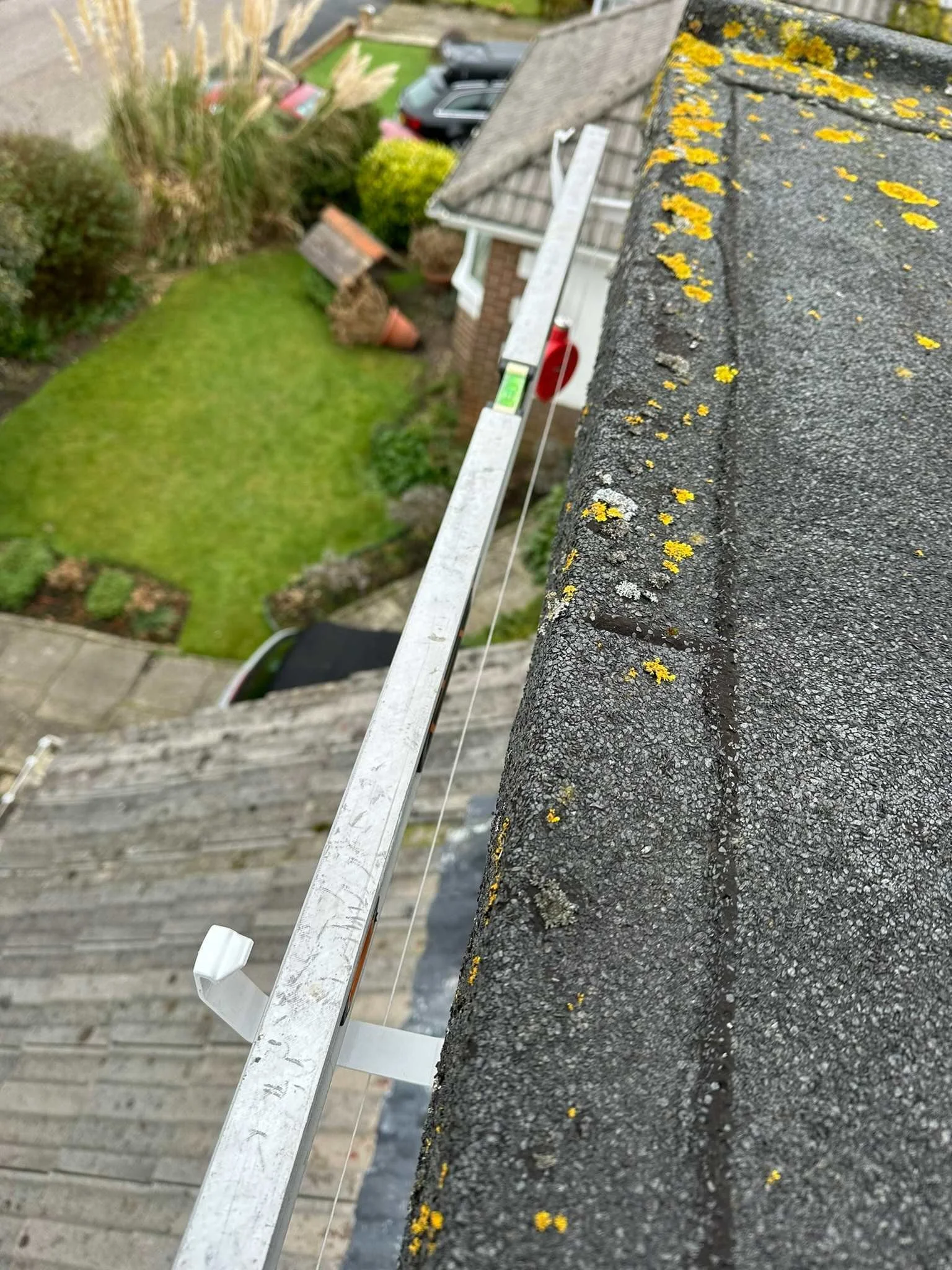 new guttering installed with stringline and level .jpg