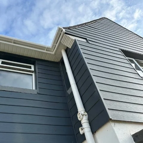 front view of a semi-detached property in Poole fitted with new white UPVC fascias and white square guttering