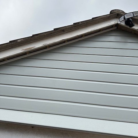 front view of the garage fitted with new agate grey cladding