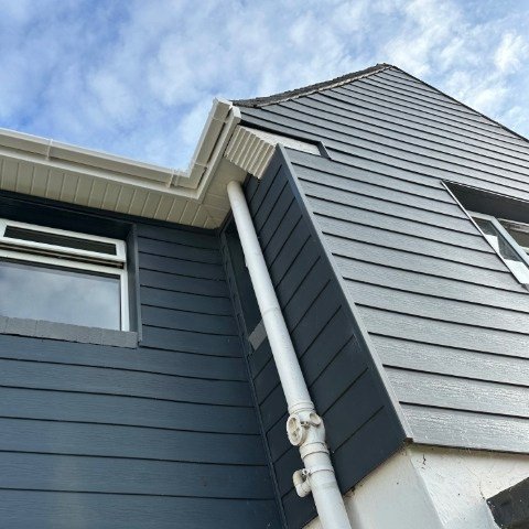 front view of a semi-detached property in Poole fitted with new white UPVC fascias and white UPVC square guttering