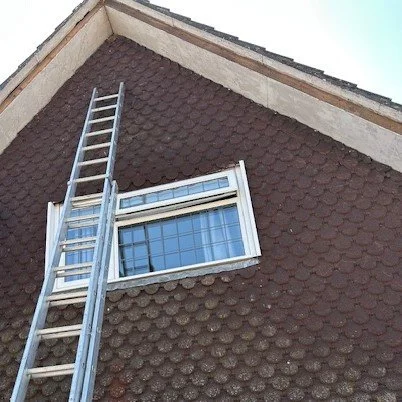 image showing the bargebaords removed from a gable end in readiness for new upvc barge boards
