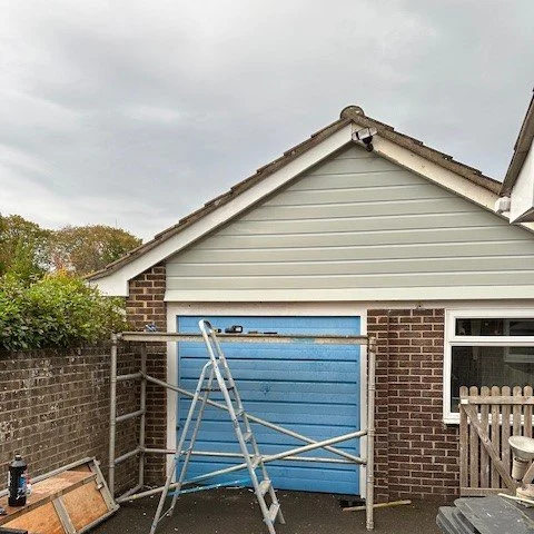 new cladding fitted to the front of the garage