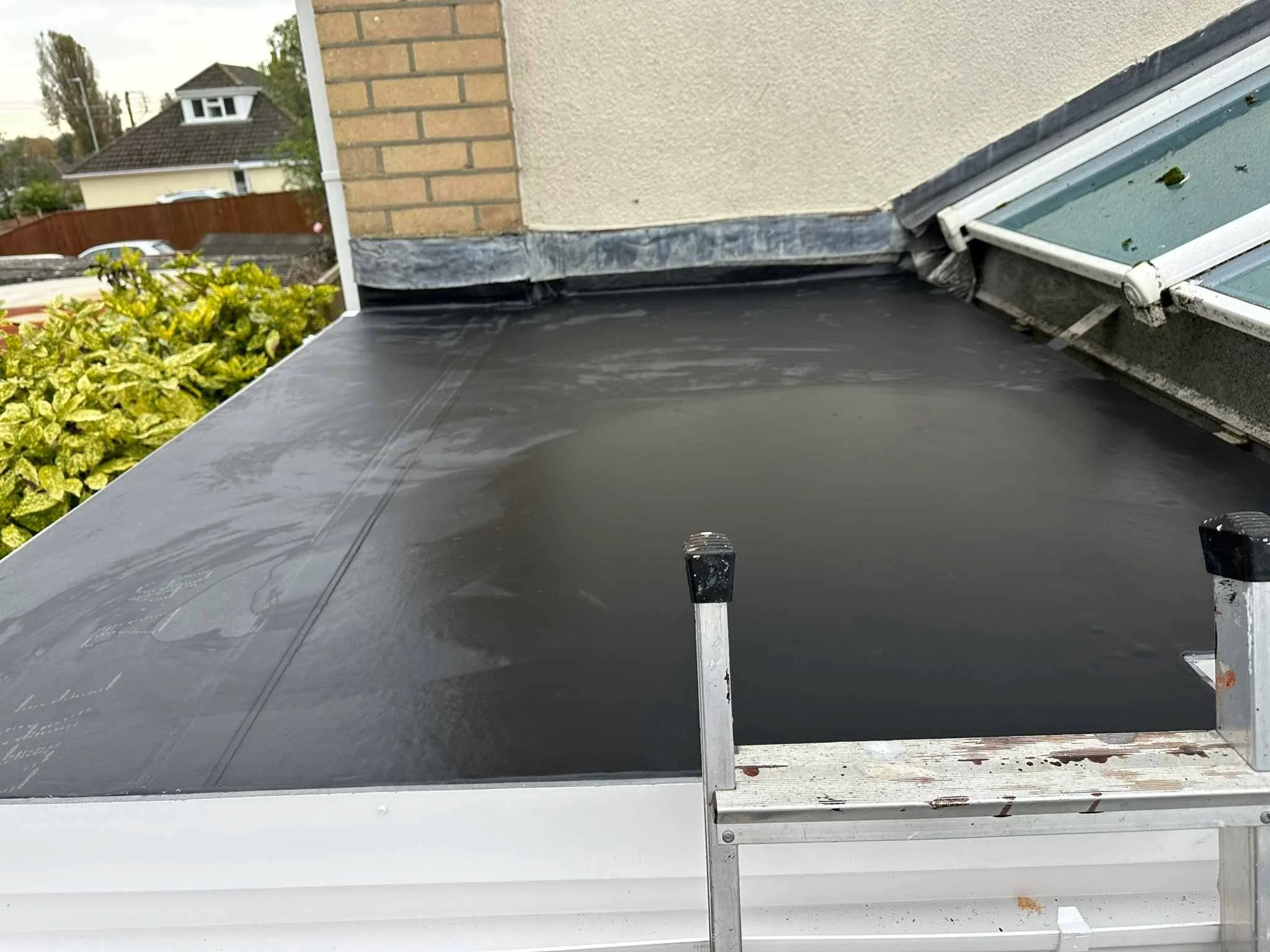 EPDM being installed.jpg