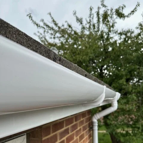 close up of white deep flow guttering